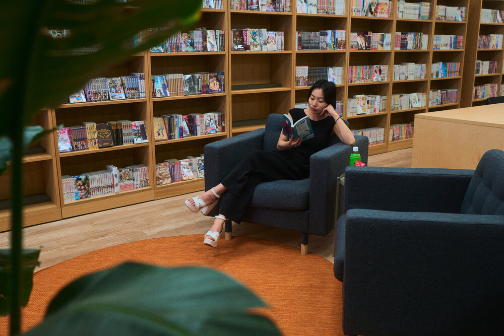Comfortable lounge space with bookshelves and seating
